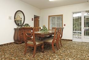 Mankato apartment for rent - a dining room with a table and chairs