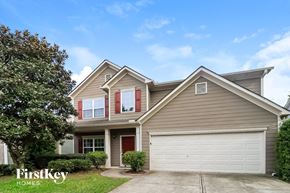 Woodstock house for rent - A two-story house with a garage is for sale.
