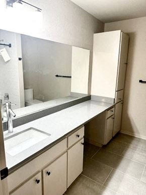 San Antonio apartment for rent - A white sink is in a white counter top in a white bathroom.