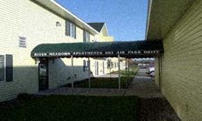 Aitkin apartment for rent - a building with a sign that says allied nation apartments and an air park drive