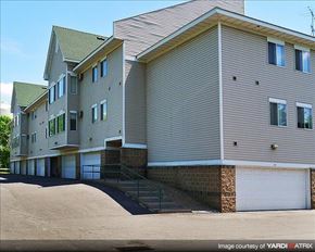 Sauk Rapids apartment for rent - a group of houses with stairs and a driveway