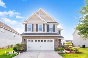 Ladson house for rent - A house with a garage and a driveway is for sale.