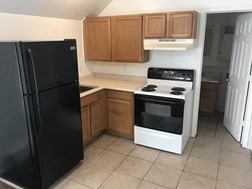 Colorado Springs apartment for rent - a kitchen with a stove and a refrigerator