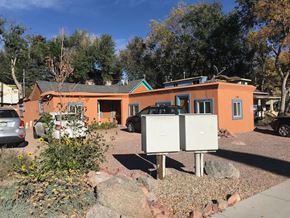 Colorado Springs apartment for rent - a house with two electrical boxes in front of it