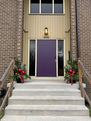 Kentwood apartment for rent - the front door of a church decorated for christmas