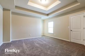 Braselton house for rent - the master bedroom has a large closet and a door to the ensuite bathroom