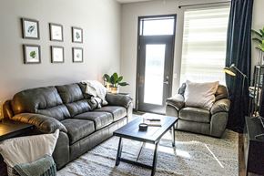 Waukee apartment for rent - a living room with two couches and a coffee table