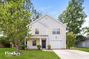 Summerville house for rent - A two-story house with a garage is for sale.