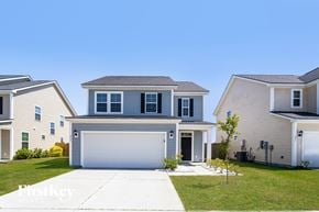 Summerville house for rent - A house with a garage is shown in the image.