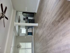 Albany house for rent - an overhead view of a living room with a ceiling fan