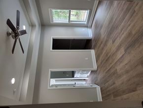 Albany house for rent - a view from the top of a staircase looking down into a room with a window