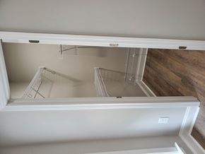 Albany house for rent - an empty closet with two empty shelves in it