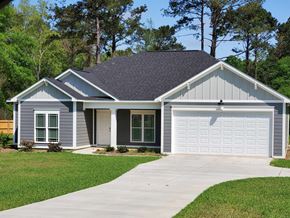 Albany house for rent - a house with a driveway and a garage door