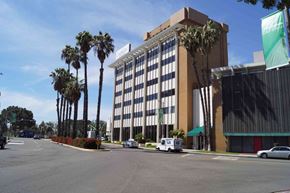 Long Beach apartment for rent - A tall building with a sign that says "SANTA" on it.