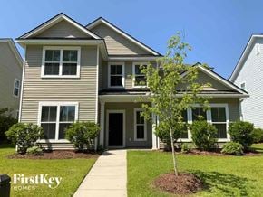 Moncks Corner house for rent - A house with a tree in front of it.