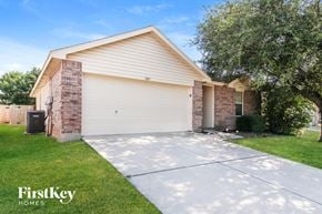Haslet house for rent - A house with a garage and a driveway is for sale.