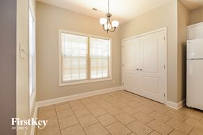 Mount Olive house for rent - a dining room with a large window and a white door