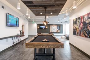 Durham apartment for rent - a game room with a pool table and a tv