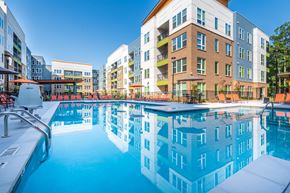 Morrisville apartment for rent - a swimming pool in front of an apartment building