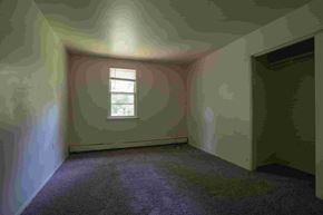Gambrills apartment for rent - A room with a window and a carpet.