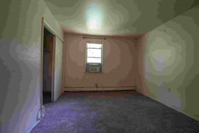 Gambrills apartment for rent - A room with a window and a door.