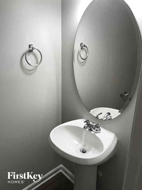 Concord house for rent - A white sink in a small bathroom.