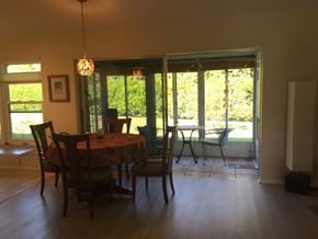 Bradenton house for rent - the dining room is open to the living room and the patio