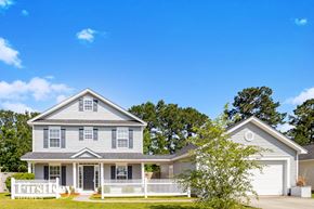 Summerville house for rent - a white house with a white fence in front of it