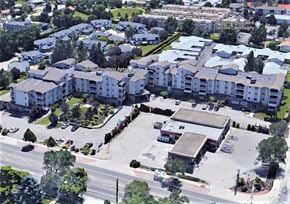 Kelowna apartment for rent - an aerial view of an apartment complex in the city