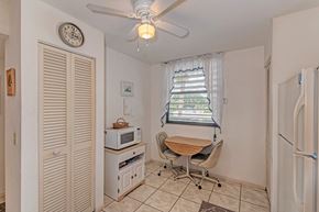 Bradenton house for rent - a dining room with a table and a microwave