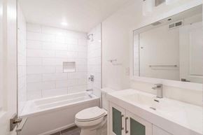 Philadelphia apartment for rent - a bathroom with a sink and a toilet and a tub