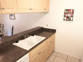 Bradenton house for rent - a kitchen with a sink and a counter top