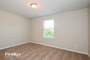 Dallas house for rent - the second bedroom is spacious and has carpeting and a window