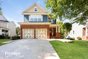 Newnan house for rent - A two-story house with a garage is for sale.