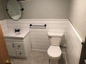 Grand Forks house for rent - a small bathroom with a toilet and a sink