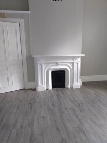 Taymil 34 benefit street apartment homes ornamental fireplace