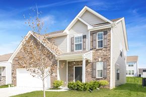 Whitestown house for rent - a house with a tree in front of it