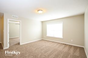 Whitestown house for rent - the upstairs bedroom has carpet and a large window