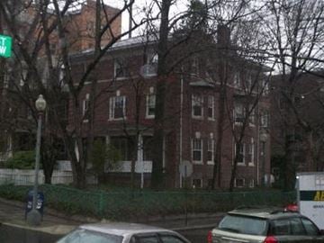 Washington apartment for rent - A white car is parked on the side of the street.