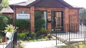 Glendale Heights apartment for rent - the front of a building with a door and a sign on it