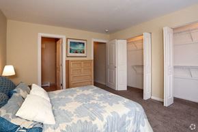 Glendale Heights apartment for rent - a bedroom with a large bed and a closet