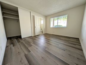 Hayward apartment for rent - A room with a sliding door and a window.