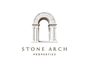 Brattleboro apartment for rent - A logo for Stone Arch Properties featuring an arch with columns.