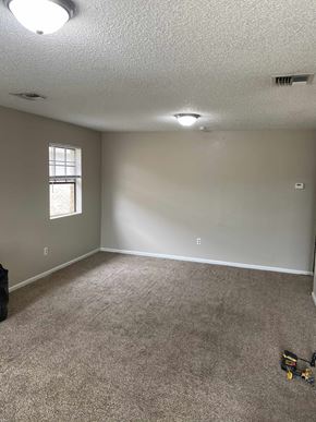 Lafayette apartment for rent - A room with a carpet floor and a window.