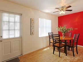 Winter Park apartment for rent - A dining room with a wooden table and chairs.