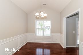 Clarkston house for rent - a dining room with white walls and a window
