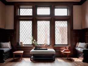 Cleveland Heights apartment for rent - A bedroom with a large bed and a window with a view of a building outside.