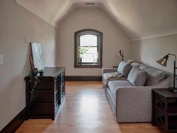 Cleveland Heights apartment for rent - A living room with a grey couch and a wooden floor.