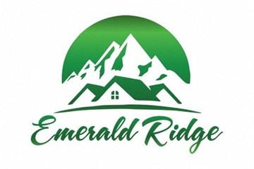 Watford City apartment for rent - the logo for emerald ridge mountain resort