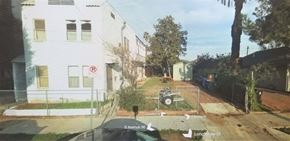 Los Angeles apartment for rent - A white building with a no parking sign on the front.